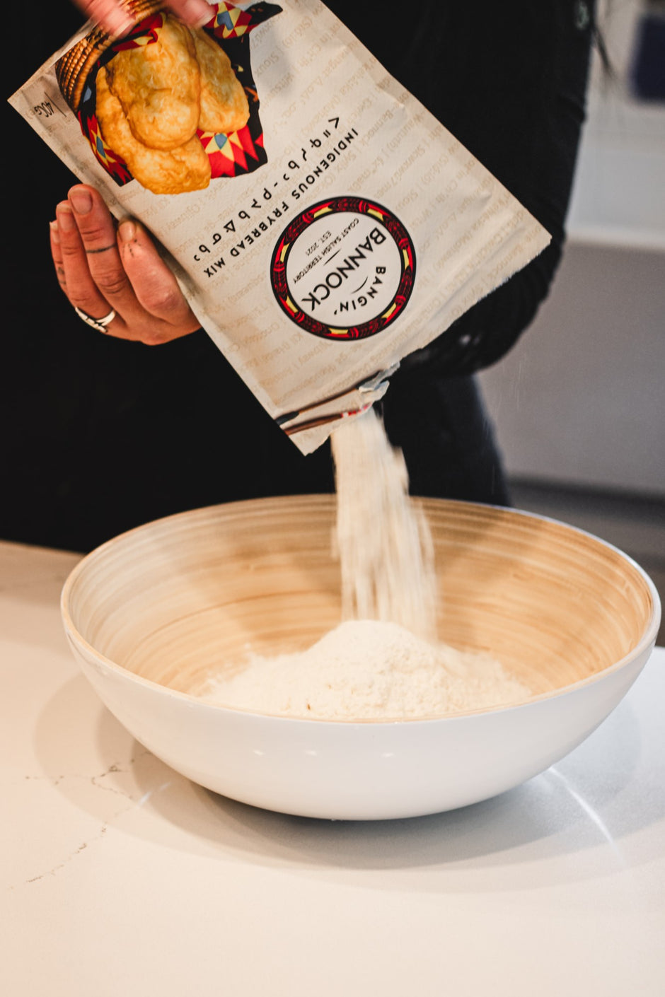 Bangin' Bannock frybread mix being poured into bowl